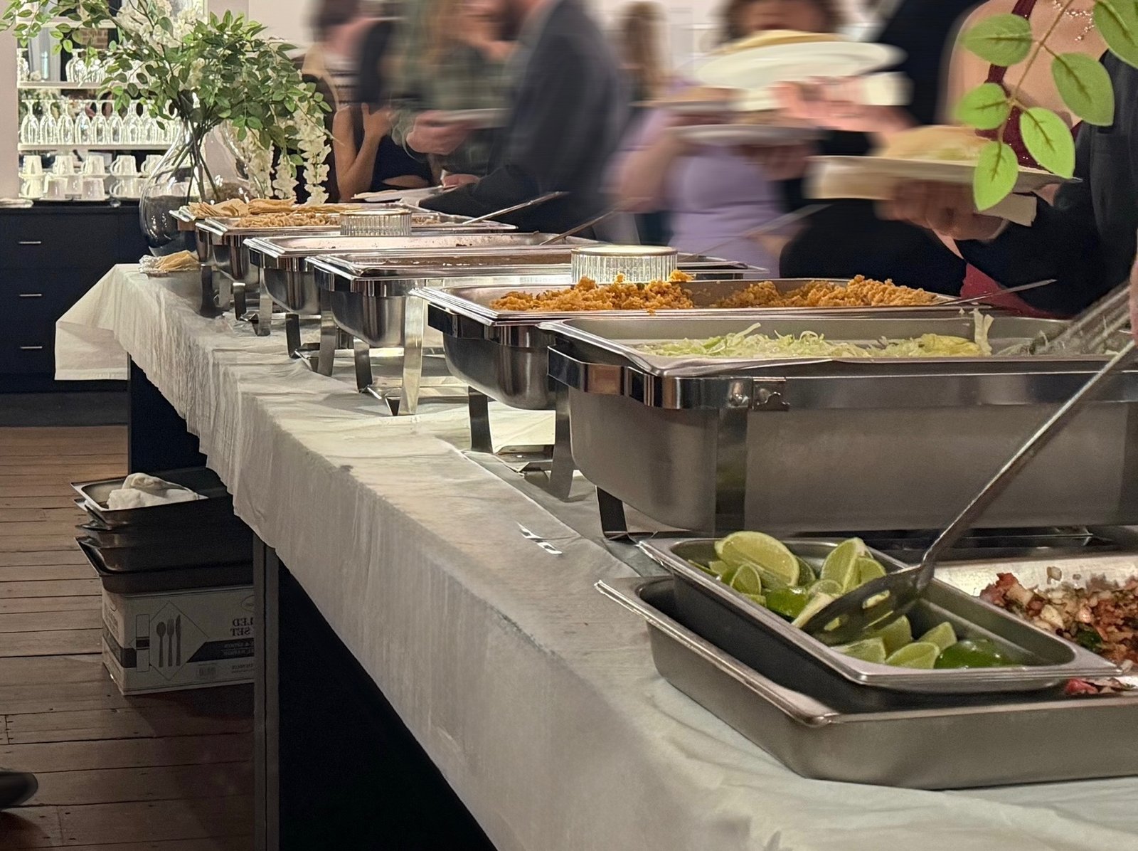 Colorful birthday party catering setup with festive Mexican decorations